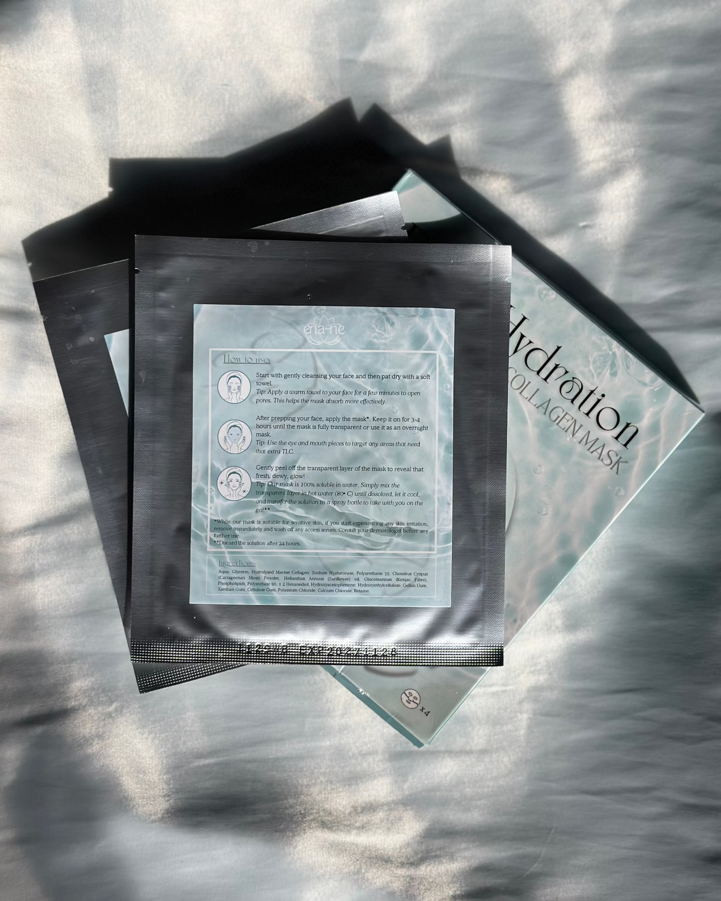 Packaged skincare product with text 'Deep Hydration Collagen Mask' on a textured surface